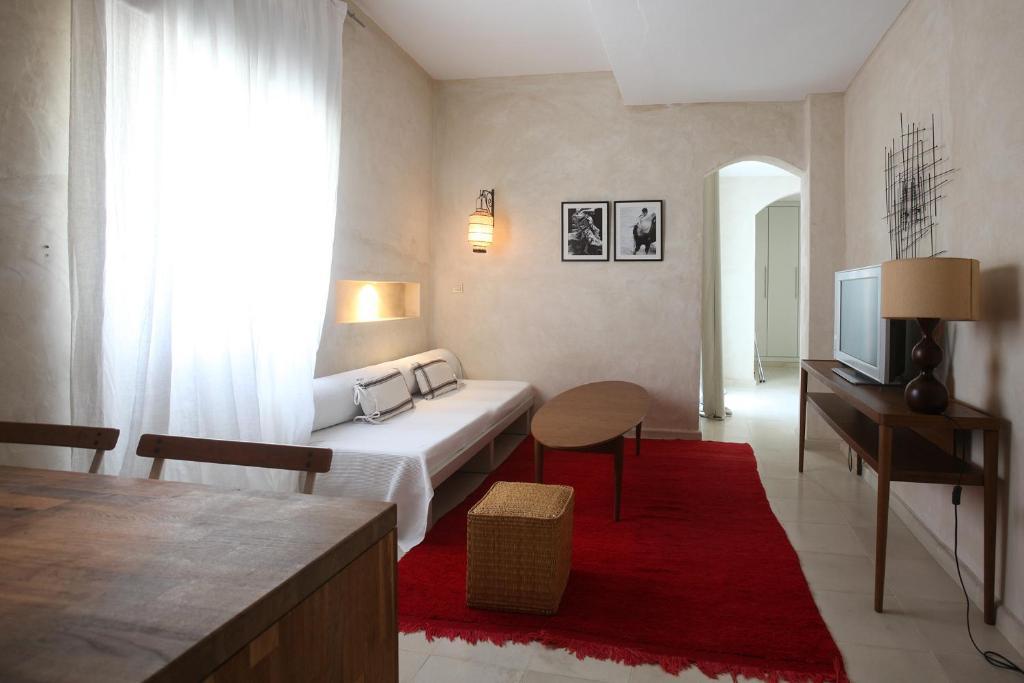 Apartamentos Caravane Tarifa Bilik gambar